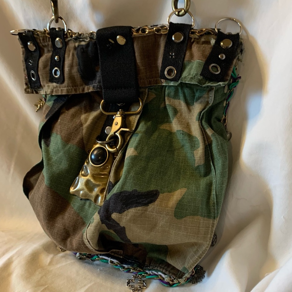 Camouflage Crossbody Bag with Gold Accents and Image of JK Punkmetal Sculpture. - Picture 2 of 7